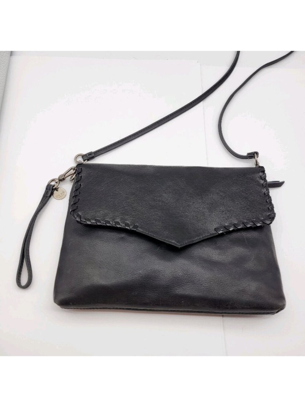The SAK Black Leather Envelope purse clutch shoulder strap Sleek
